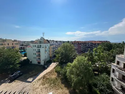an aerial view of a city with buildings and trees at Apartments Amara Sunny Beach in Sunny Beach