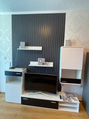 a desk with a computer on top of it at Apart hotel Gallery B in Sunny Beach