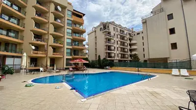 a swimming pool in front of some apartment buildings at AMADEUS 1 - 13B Large Two Bedroom Apartment in Sunny Beach