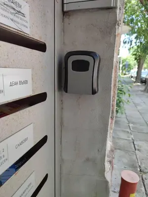 a metal locker with ajar door with a pay phone at Desafinado in Burgas City