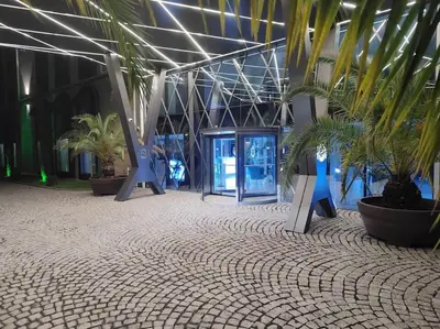a room with potted plants in a building at Apartament Harmony in Sunny Beach