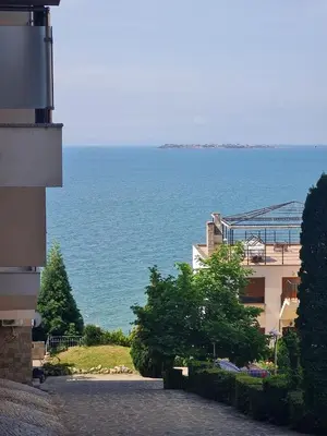 a view of the ocean from a building at Dolce Vita 2, Appartement in Sveti Vlas