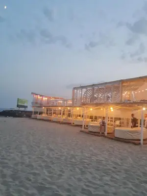a building on the beach with beds in it at Dolce Vita 2, Appartement in Sveti Vlas