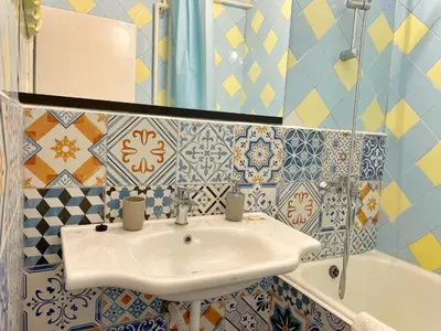 a bathroom with a sink and a tub at Holiday Home in Burgas City