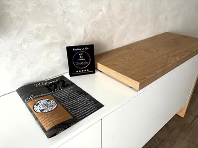 a book sitting on top of a white counter at Apartment 122 in Burgas City