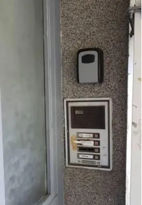 a wall with a pay phone on it at Central Apartment 5min to beach in Varna City