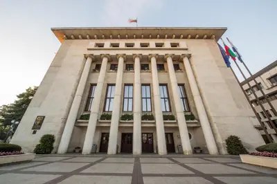 a tall building with columns on the front of it at The Square - Old Flat with 2 bedrooms, 1st fl in Burgas City