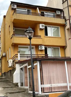 a street light in front of a building at Orange House in Sozopol