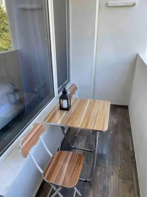 a small room with two benches and a window at Sunny Seaside Retreat in Burgas in Burgas City