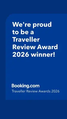 a blue sign that says were proud to be a traveller reviewagency winner at The Atelier in Burgas City
