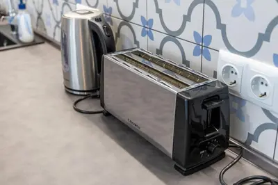 a toaster oven sitting on top of a counter at Roman Thermae Central Studio in Varna City