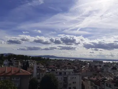 a view of a city under a cloudy sky at Magnolia in Burgas City