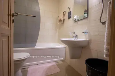 a bathroom with a sink and a toilet and a tub at Kalia apartment in Sunny Beach
