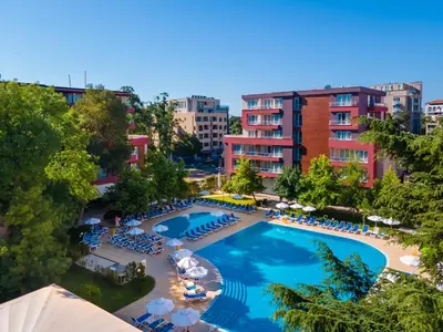 an overhead view of a swimming pool with chairs and umbrellas at Asteria Family Sunny Beach - Ultra All Inclusive in Sunny Beach
