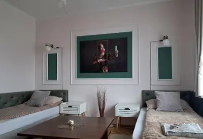 a living room with a couch and a coffee table at Festival and Congress Centre Appartment Varna in Varna City