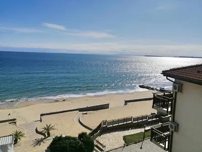 a view of the beach from a building at Garden of Eden - Studio in Sveti Vlas