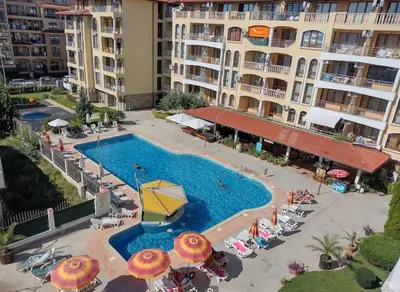 an overhead view of a swimming pool in a hotel at Menada Royal Dreams Apartments in Sunny Beach