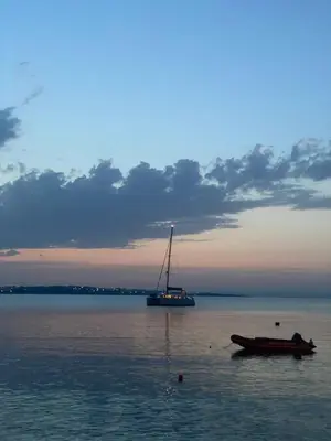 a sail boat and a boat in the water at Summer Breeze Park Apartment, Santa Marina Holiday Village, Sozopol in Sozopol