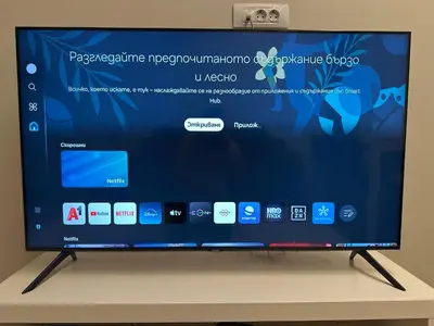 a flat screen tv sitting on top of a table at Central Apartment in Varna in Varna City