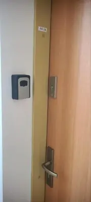 a door with a tv on the side of it at Apartment Oasis A4 Kamchia in Bliznatsi