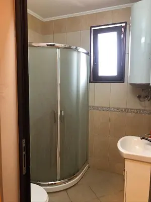 a bathroom with a shower and a sink at Apartament Marinela 2 in Pomorie
