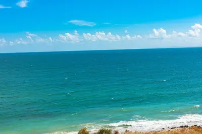 a view of the ocean from a beach at Menada Aheloy Apartments in Aheloy