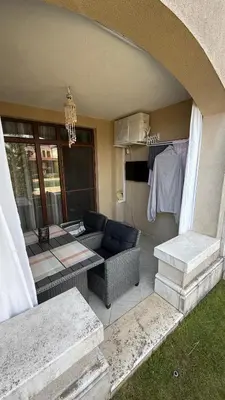 a living room with a couch and a table at Kavaci Studio Beach Sozopol in Sozopol