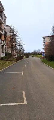 an empty street with buildings on the side of the road at Kavaci Studio Beach Sozopol in Sozopol