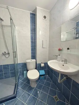 a bathroom with a toilet and a sink and a shower at Apartment Nani -Sunny beach in Sunny Beach