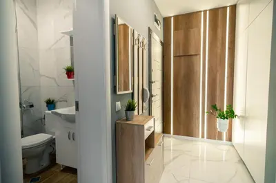 a bathroom with a toilet and a sink at Sky Residence Burgas with FREE Garage - Sky Apartments Burgas in Burgas City
