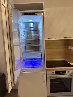 an empty refrigerator with its door open in a kitchen at Studio CASCADAS FAMILY RESORT in Sunny Beach
