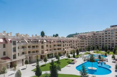 an aerial view of a large apartment complex with a courtyard at Seaside Apartment in Varna City