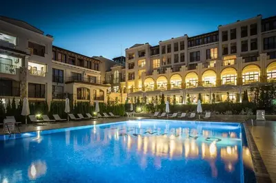 a large swimming pool in front of a building at Ваканционна Къща в Greenn Life Созопол in Sozopol