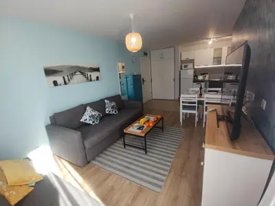 a living room with a couch and a table at Apartament Prestige Fort - Bastet BS in Sveti Vlas