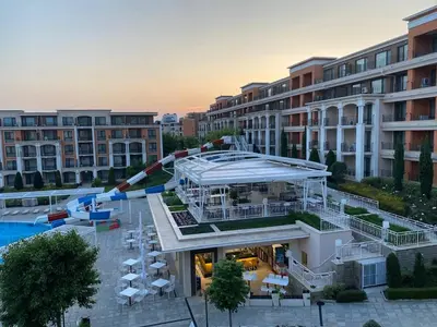 a hotel with a pool and a water slide at Premier Fort Beach ap. №376 section: E-3 in Sveti Vlas