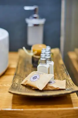 a tray with two bottles of soap on a table at Florance Rentals Luxury Apartments in Burgas in Burgas City
