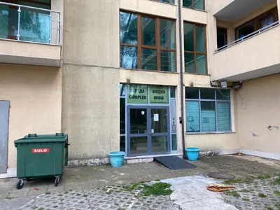 a building with a trash can in front of it at YS Residence in Sunny Beach