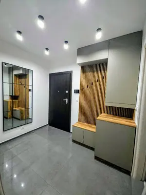 a empty room with a door and a mirror at Central Park Galleria in Burgas City