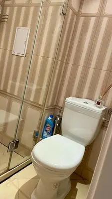 a bathroom with a white toilet in a room at 2 Room Apartment in Luxury Complex Sunny Beach in Sunny Beach