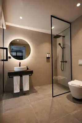a bathroom with a sink and a toilet and a mirror at Bizarre Boutique Hotel in Varna City