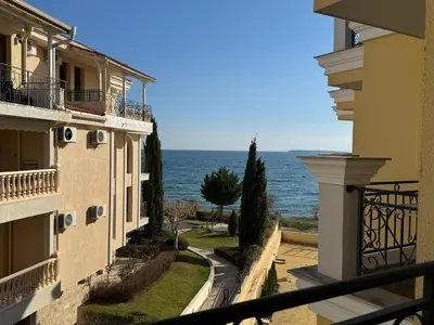 a view of the ocean from the balcony of a building at HORIZON 19 'A' APARTMENT Sveti Vlas in Sveti Vlas