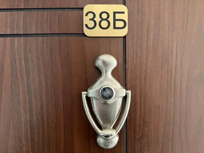 a door knob with the number on it at HORIZON 38 'Б' Studio Sveti Vlas in Sveti Vlas