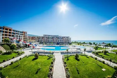 an aerial view of a resort with a swimming pool at Seaside Serenity Studio - Premier Fort Beach in Sveti Vlas