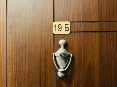 a wooden door with a number on it at HORIZON 19 'Б' Studio Sveti Vlas in Sveti Vlas