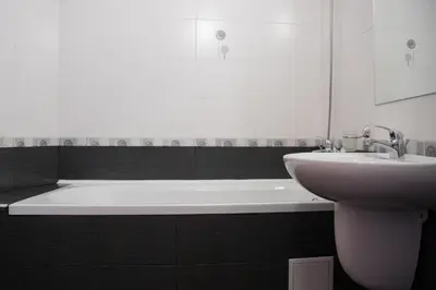 a bathroom with a bath tub and a sink at Studio in Garden of Eden D402 - Sveti Vlas, Bułgaria in Sveti Vlas
