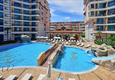 a large swimming pool in front of a building at Karolina Apartment 65 in Sunny Beach