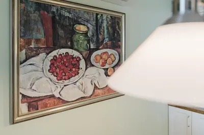 a painting of a table with a bowl of fruit at Sozopol Созопол MORE SUN 2 Б Sozopolis in Sozopol
