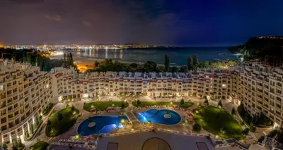an aerial view of a resort at night at Seaside View Apartment in Varna in Varna City