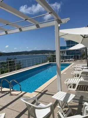a swimming pool on the deck of a cruise ship at Апартамент Лариди in Sozopol