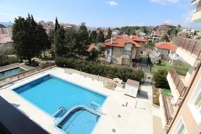 an overhead view of a swimming pool in a building at Horizont - Menada Apartments in Sunny Beach